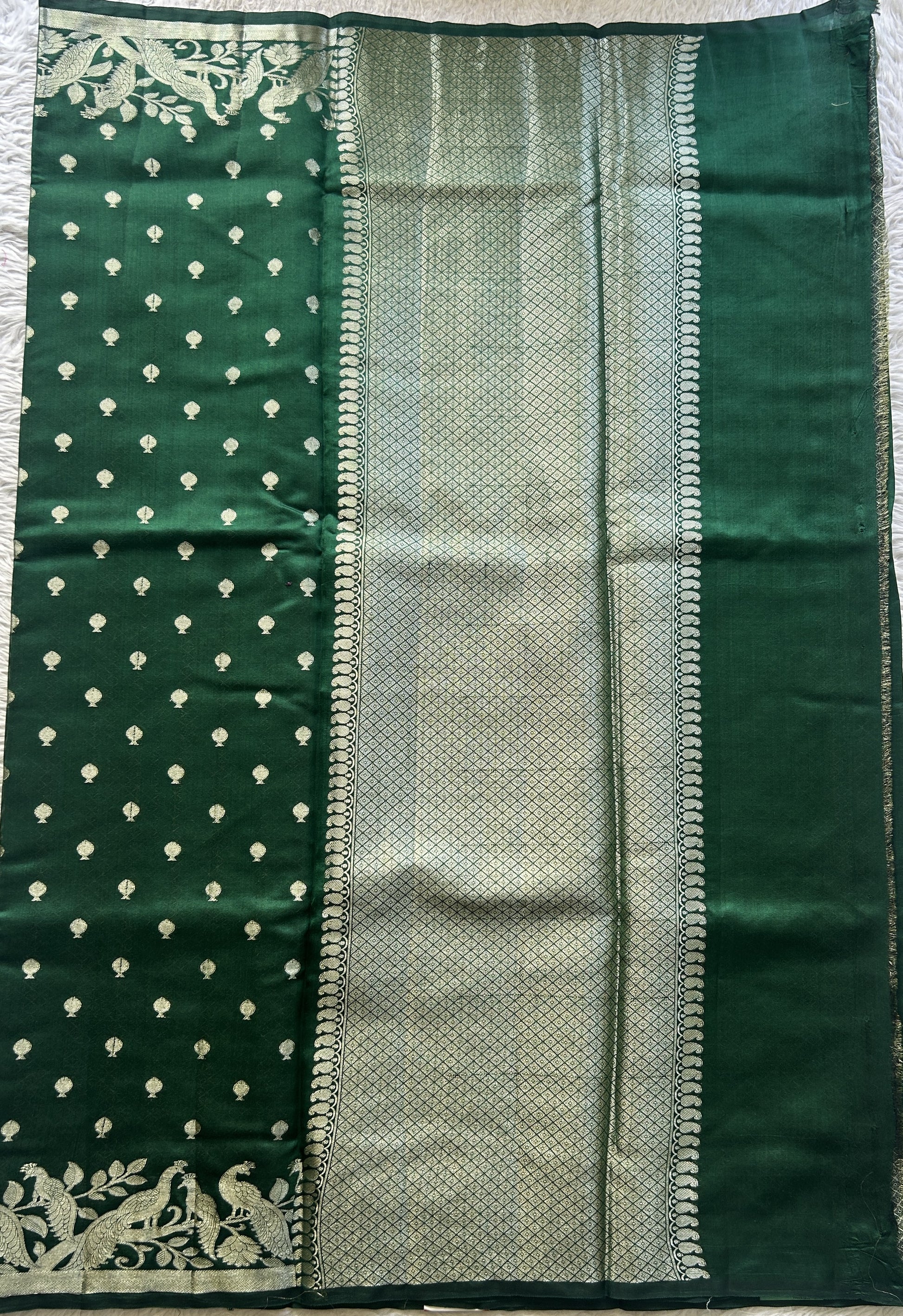 Chiniya Silk Saree Dark Green Colored Elegantly Paired with a Jal Border. - Sampradaya Designer Studio