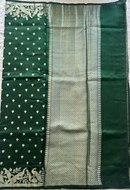 Chiniya Silk Saree Dark Green Colored Elegantly Paired with a Jal Border. - Sampradaya Designer Studio