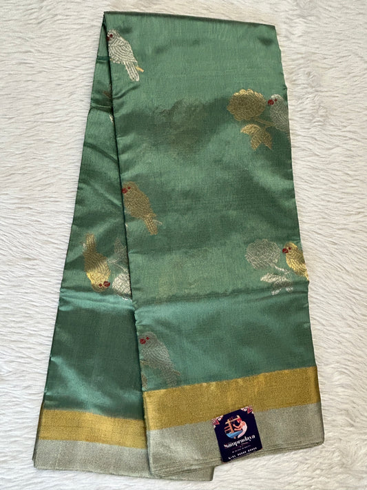 Chanderi Pattu Saree Cool Green colored saree complemented with a Gold &Silver Zari border - Sampradaya Designer Studio