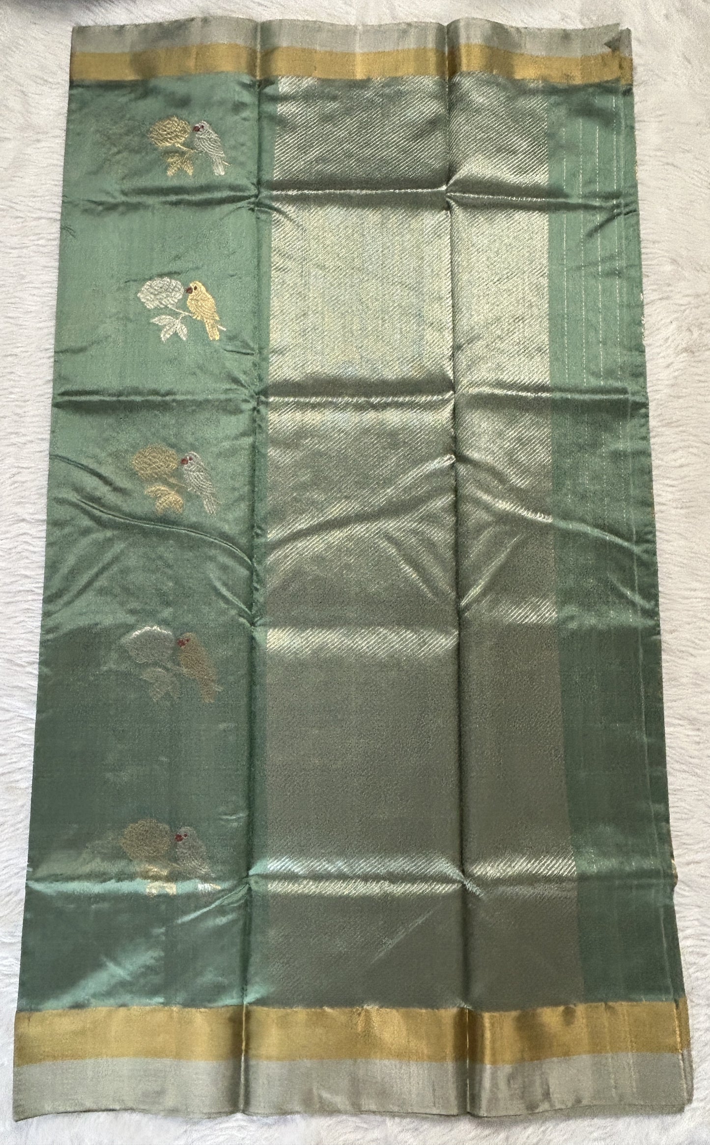 Chanderi Pattu Saree Cool Green colored saree complemented with a Gold &Silver Zari border - Sampradaya Designer Studio