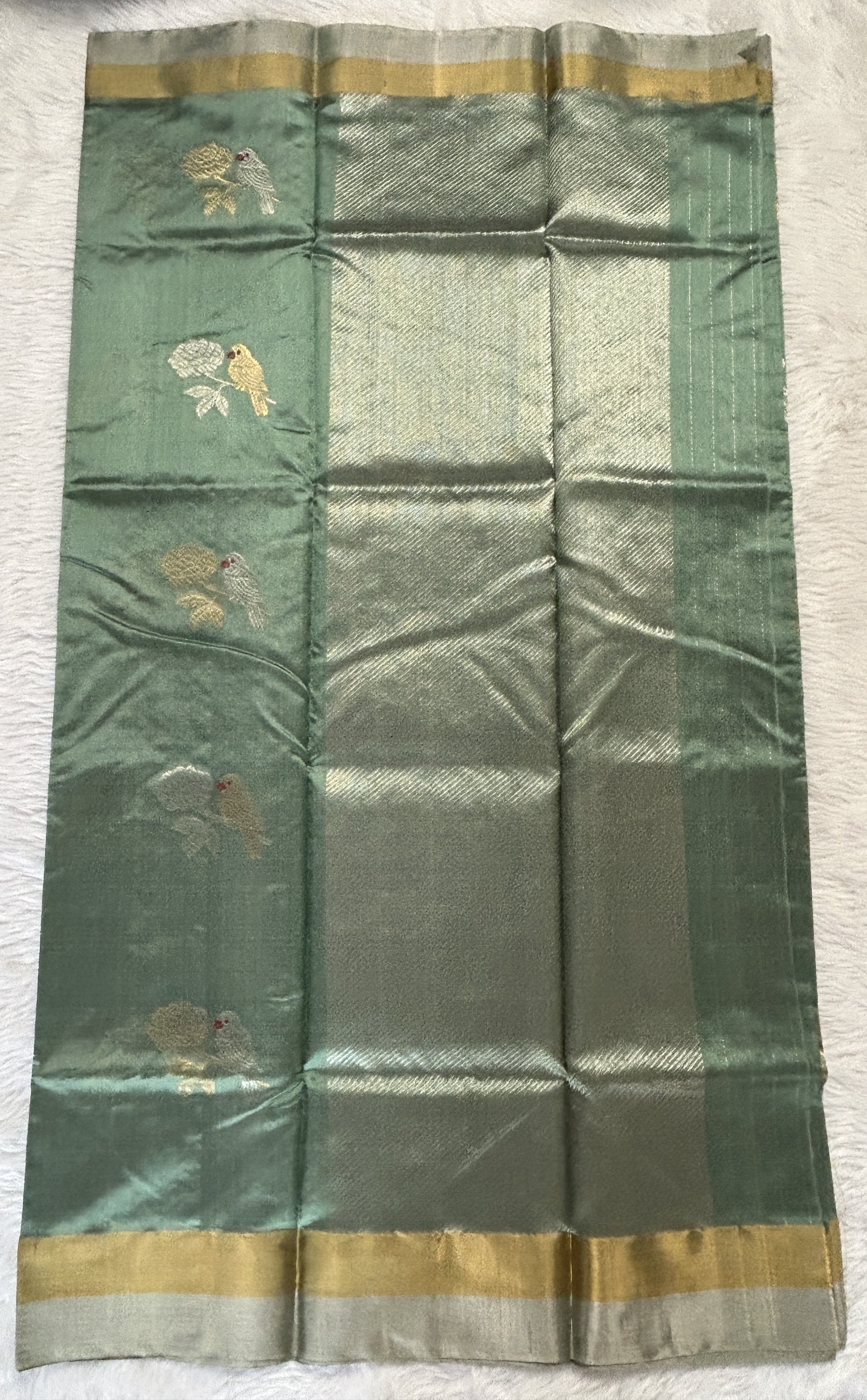 Chanderi Pattu Saree Cool Green colored saree complemented with a Gold &Silver Zari border - Sampradaya Designer Studio