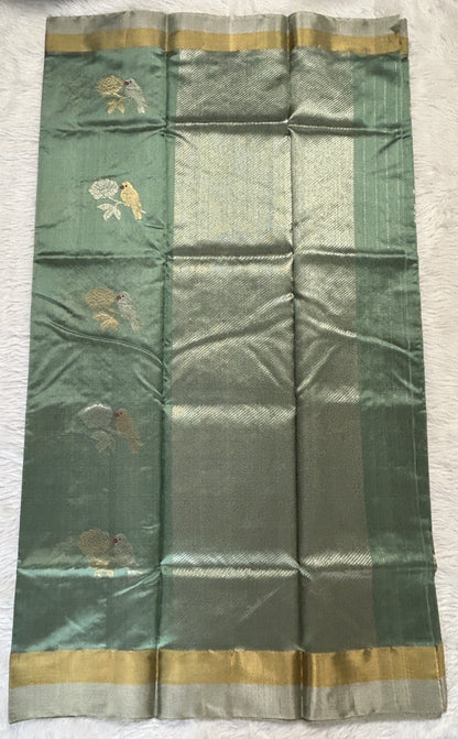 Chanderi Pattu Saree Cool Green colored saree complemented with a Gold &Silver Zari border - Sampradaya Designer Studio