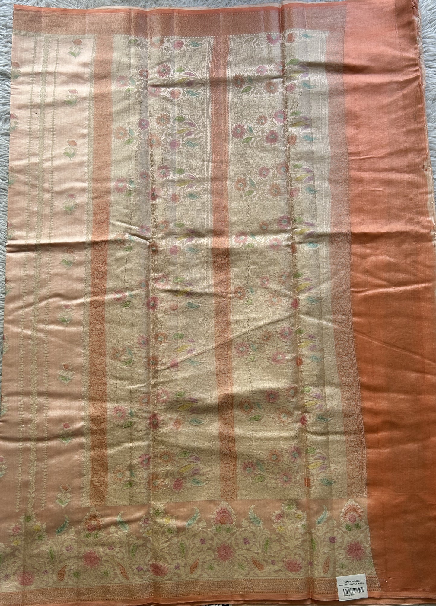 Chiniya Silk Saree Light Peach Colored Elegantly Paired with a Minakari Border. - Sampradaya Designer Studio