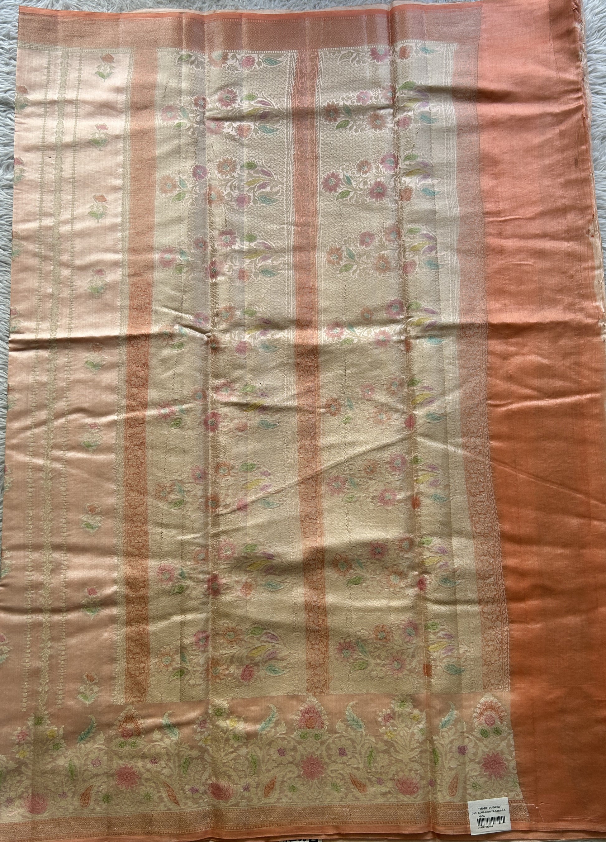 Chiniya Silk Saree Light Peach Colored Elegantly Paired with a Minakari Border. - Sampradaya Designer Studio
