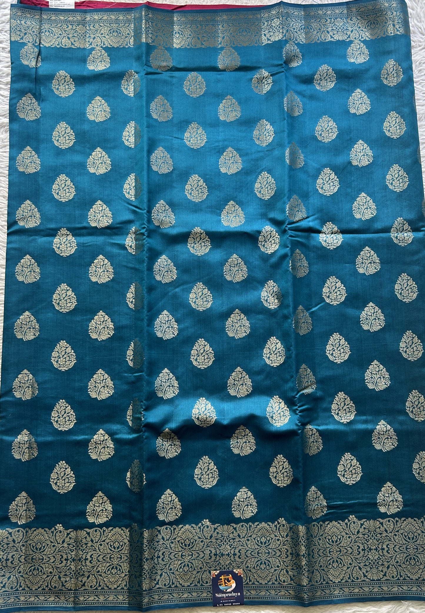 Chiniya Silk Saree German Blue Colored Elegantly Paired with a Zari Border. - Sampradaya Designer Studio