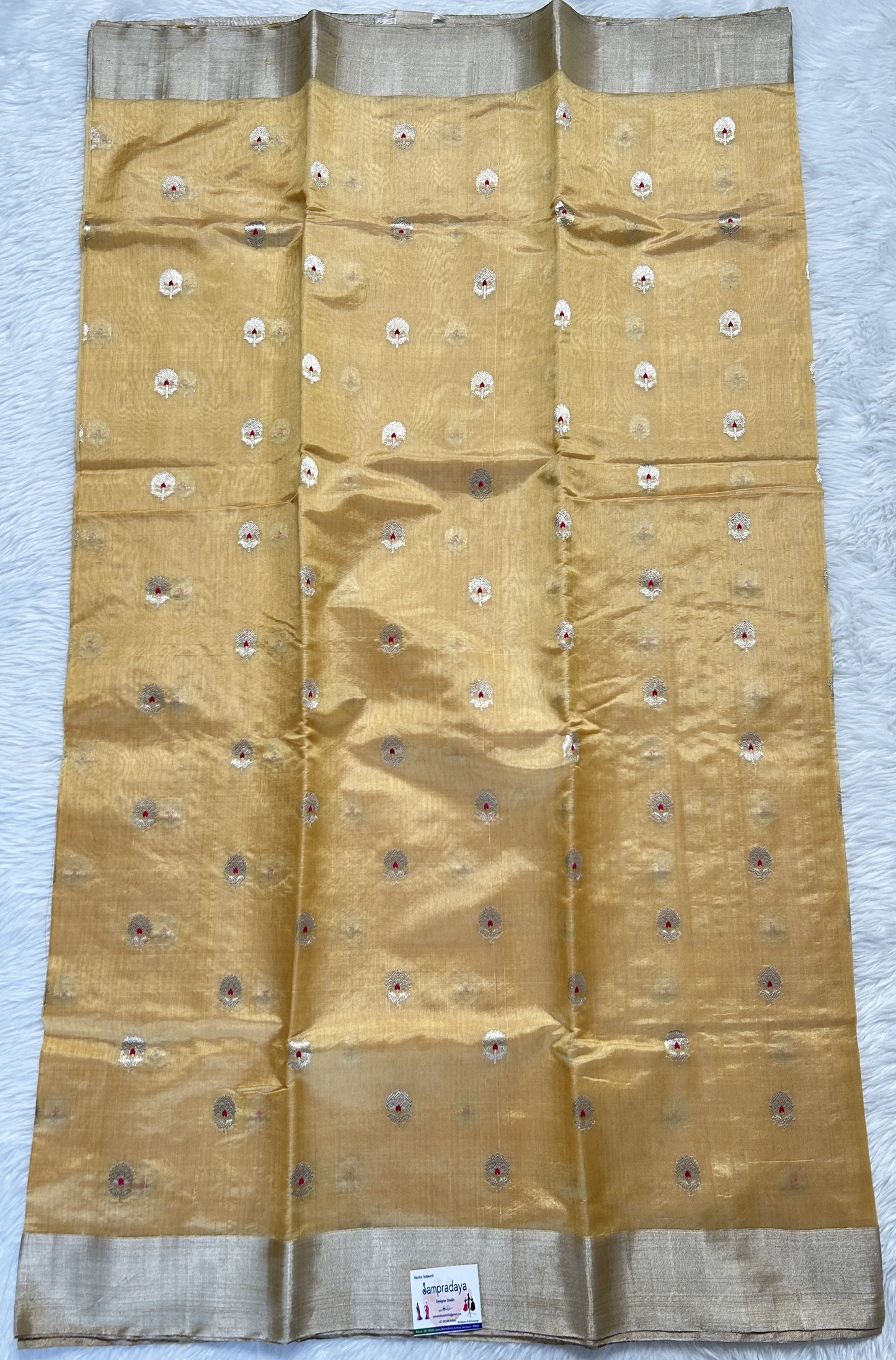 Chanderi Pattu Saree Creamy Yellow colored saree complemented with a Silver Zari border - Sampradaya Designer Studio