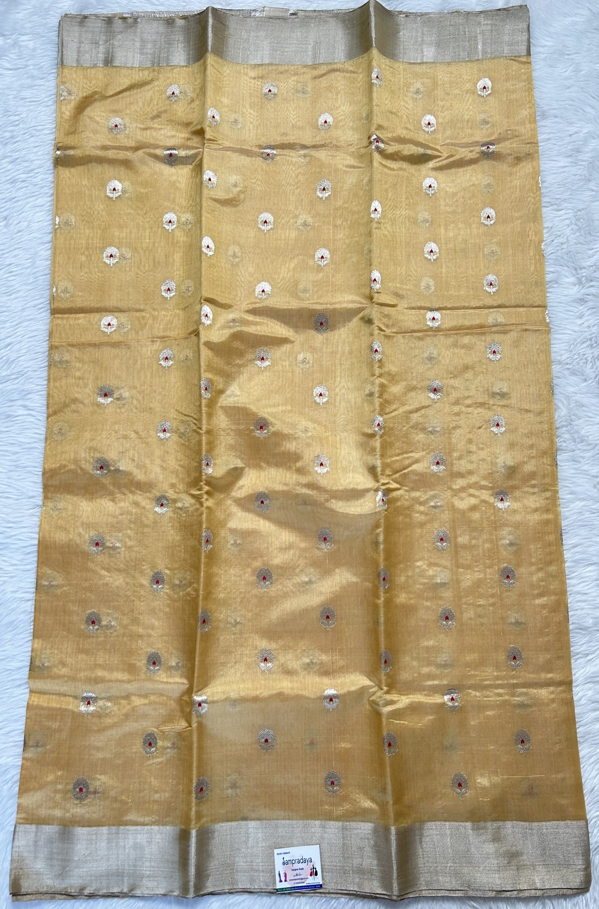 Chanderi Pattu Saree Creamy Yellow colored saree complemented with a Silver Zari border - Sampradaya Designer Studio