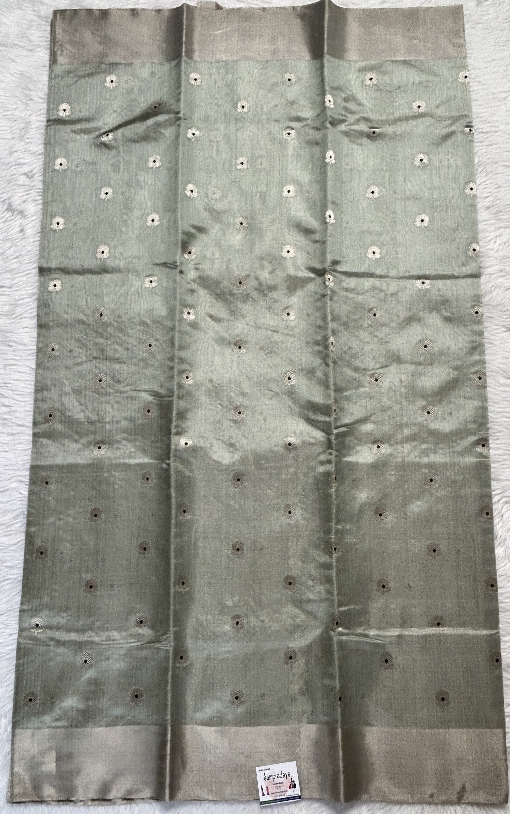 Chanderi Pattu Saree Pastel Green colored saree complemented with a Silver Zari border - Sampradaya Designer Studio
