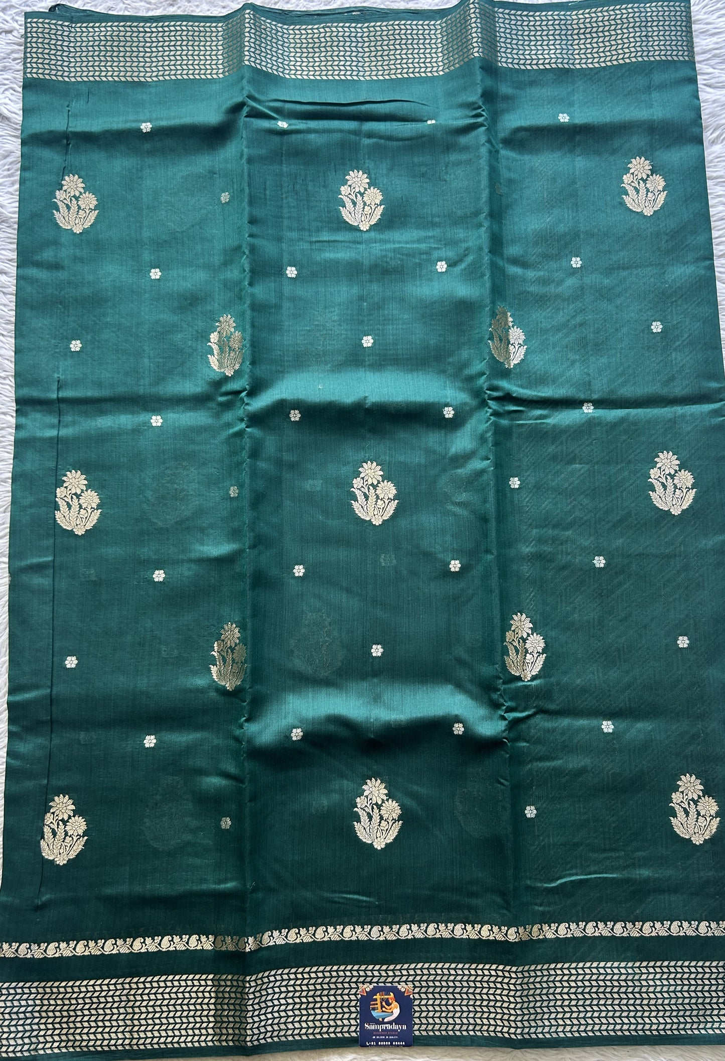 Chiniya Silk Saree Bottle Green Colored Elegantly Paired with a Zari Border. - Sampradaya Designer Studio