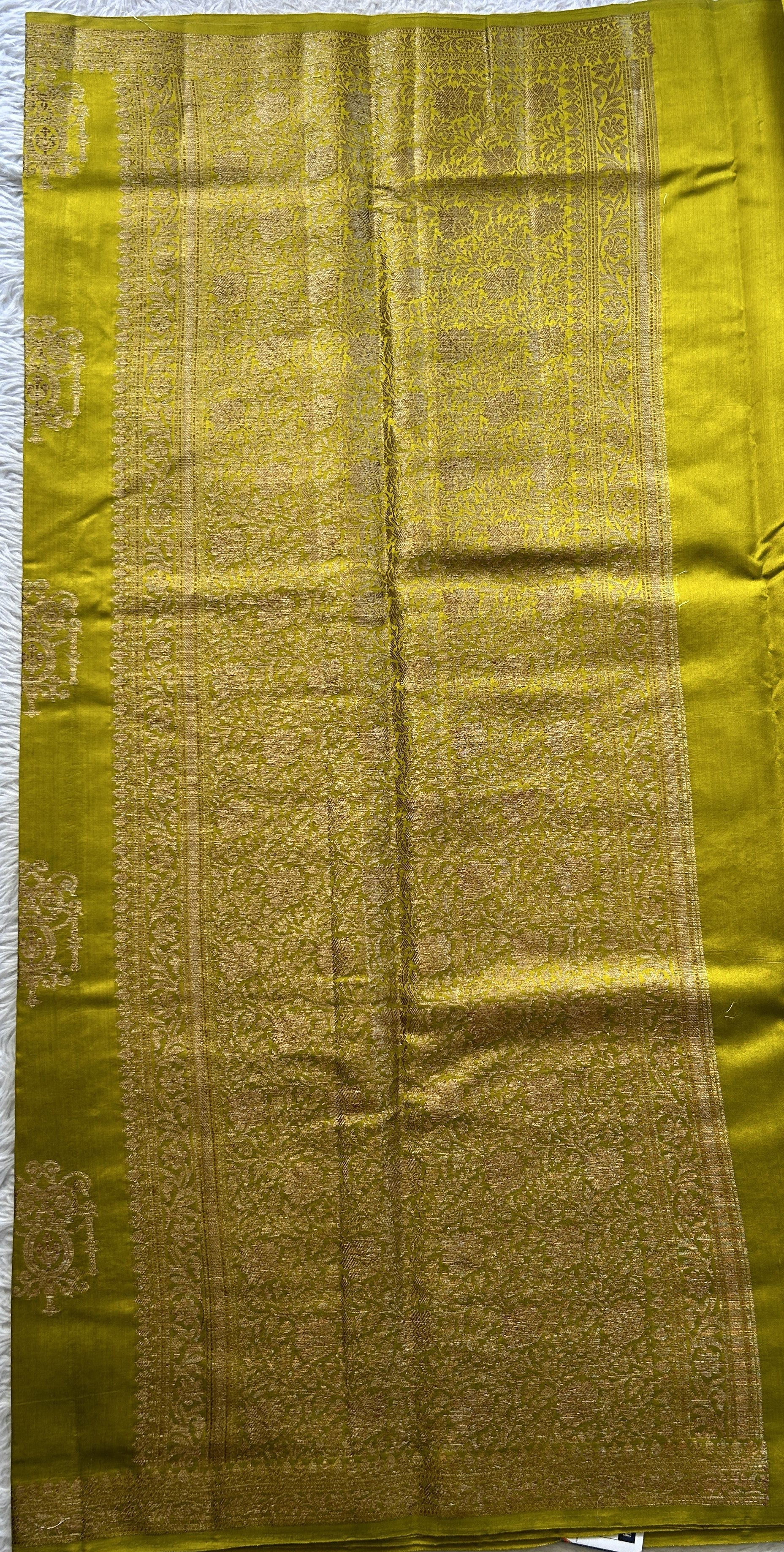 Chiniya Silk Saree Yellow Colored Elegantly Paired with a Zari Border. - Sampradaya Designer Studio