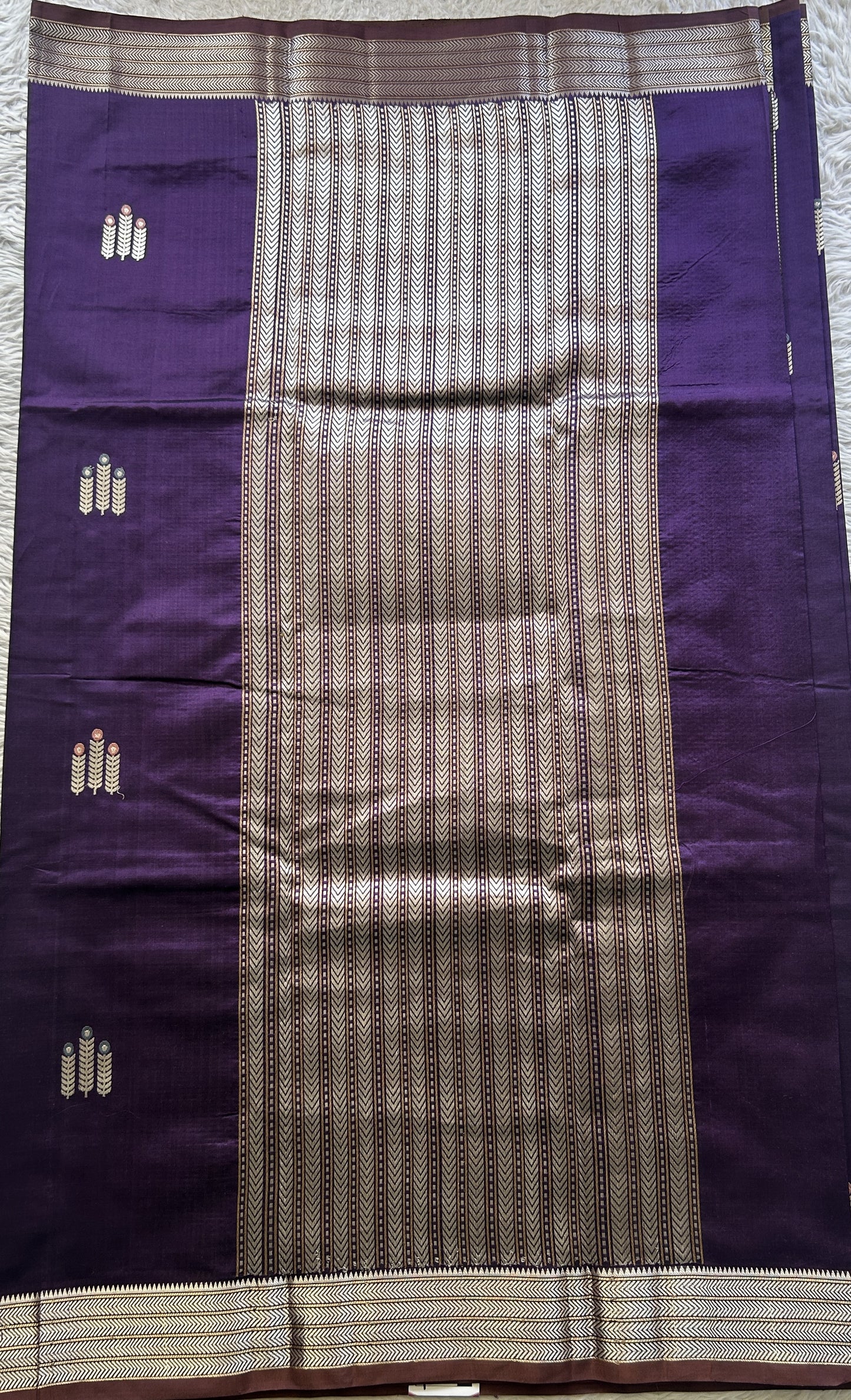 Banarasi Katan Silk Saree Brinjal Colored Elegantly Paired with a Zari border. - Sampradaya Designer Studio