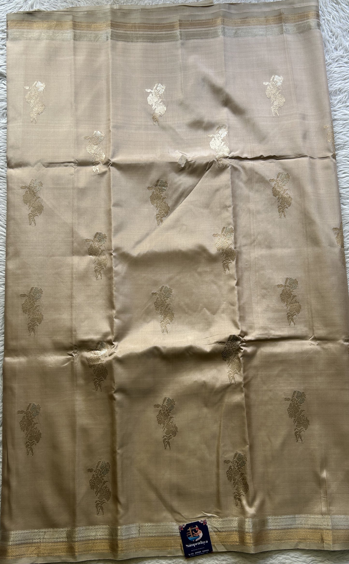 Banarasi Katan Silk Saree Biscuit Colored Elegantly Paired with a Zari border. - Sampradaya Designer Studio