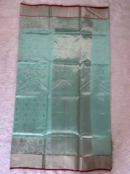 Chanderi Pattu Saree Mint Green colored saree complemented with a Silver Zari border - Sampradaya Designer Studio