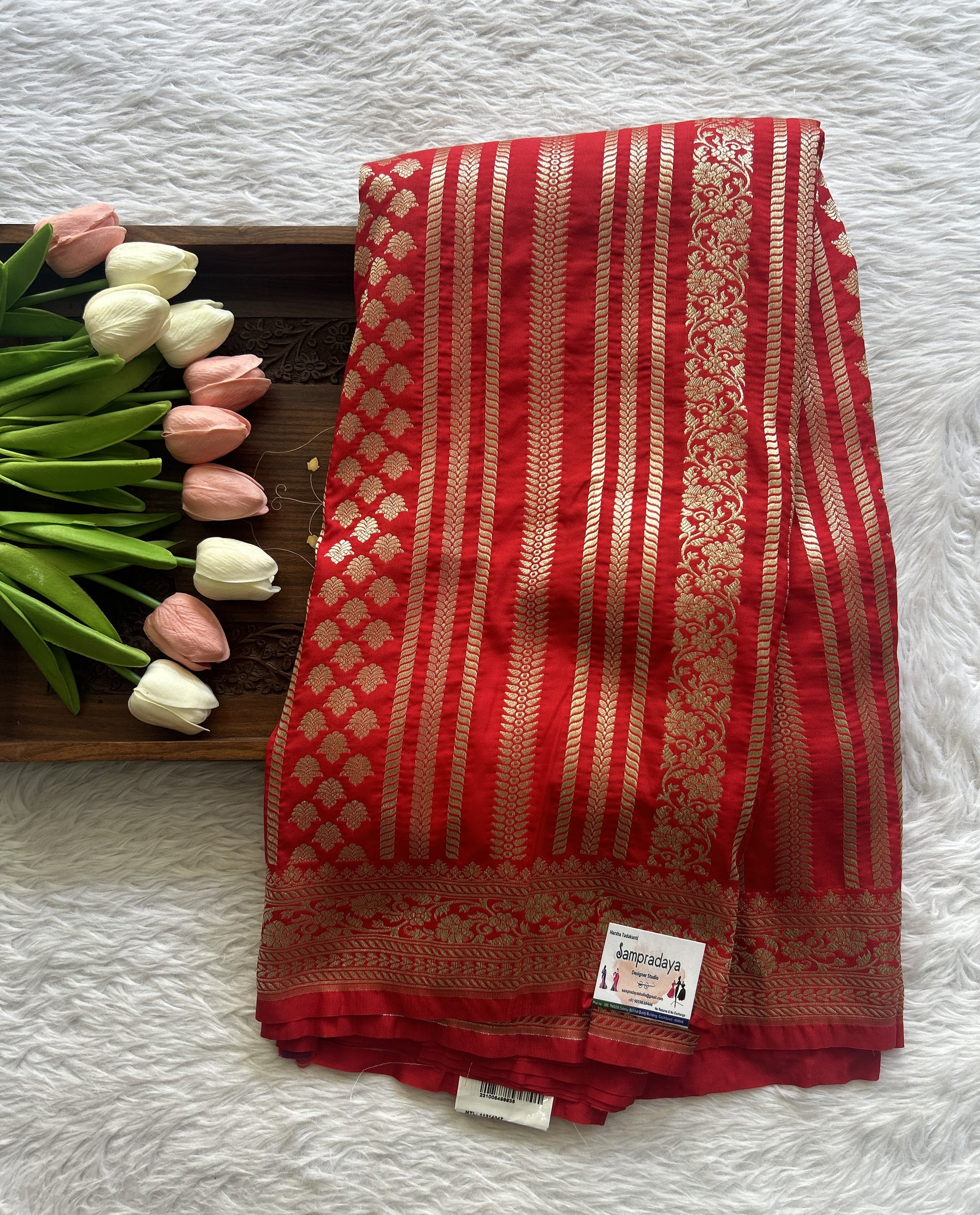 Banarasi Semi Katan Saree Red Colored Complemented with a Zari Border. - Sampradaya Designer Studio