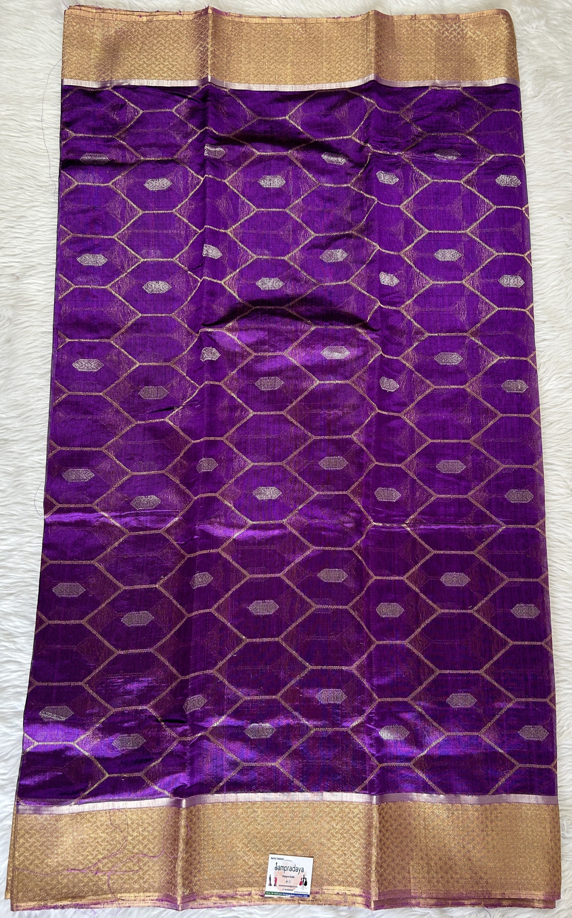 Chanderi Pattu Saree Purple colored saree complemented with a Gold Zari border - Sampradaya Designer Studio