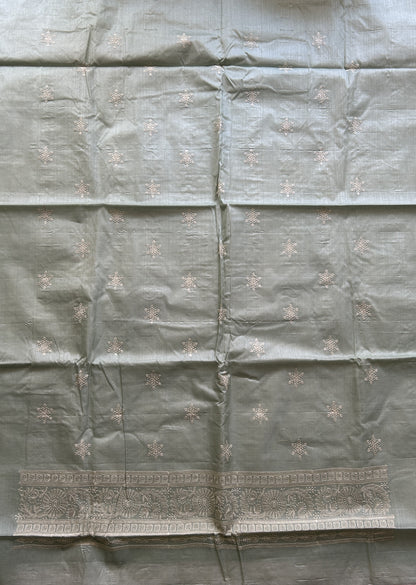 Tussar Silk Dress Material Sea Green Colored Complemented with a Embroidery Border. - Sampradaya Designer Studio