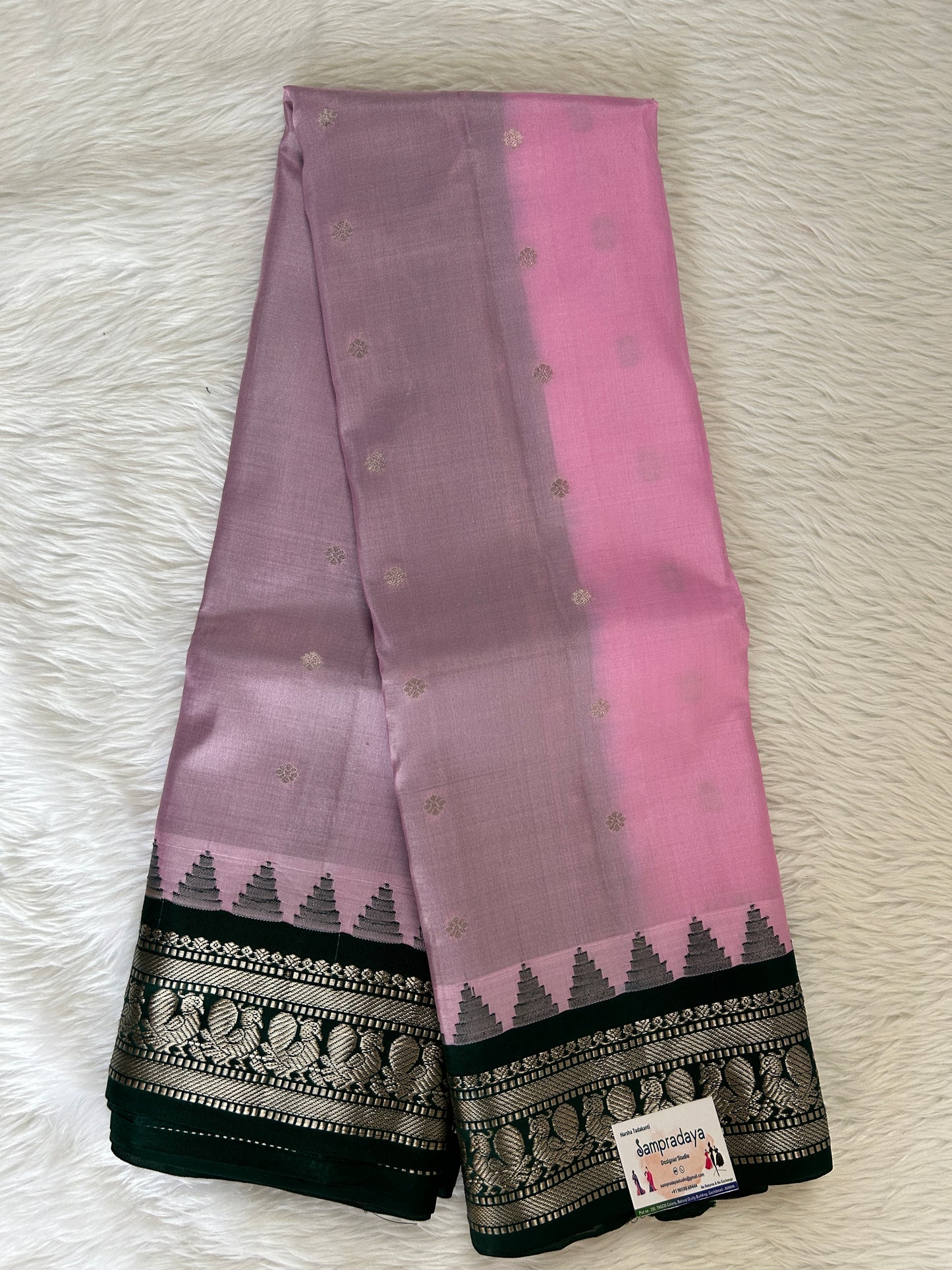Gadwal Pattu Saree Baby Pink colored saree complemented with a Bottle green Kanchi Border - Sampradaya Designer Studio