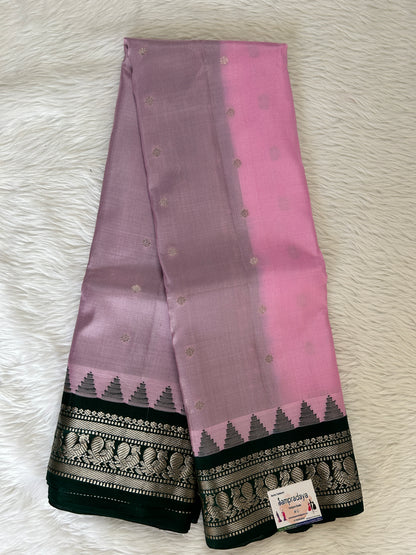Gadwal Pattu Saree Baby Pink colored saree complemented with a Bottle green Kanchi Border - Sampradaya Designer Studio
