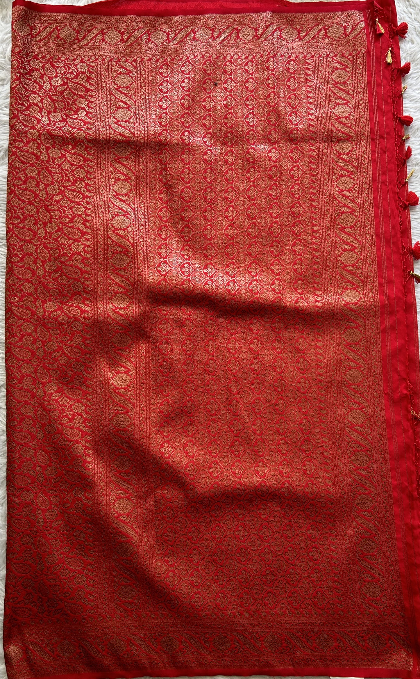 Banarasi Semi Katan Saree Red Colored Complemented with a Zari Border. - Sampradaya Designer Studio