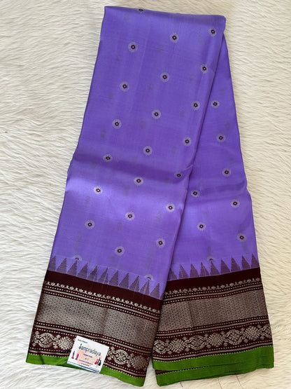 Gadwal Pattu Saree Lavender colored saree complemented with a Brown Kanchi Border - Sampradaya Designer Studio
