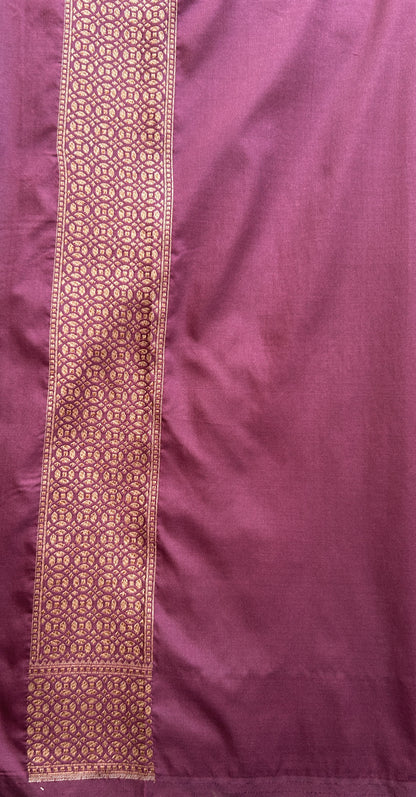 Banarasi Semi Katan Saree Dark Maroon Colored Complemented with a Zari Border. - Sampradaya Designer Studio