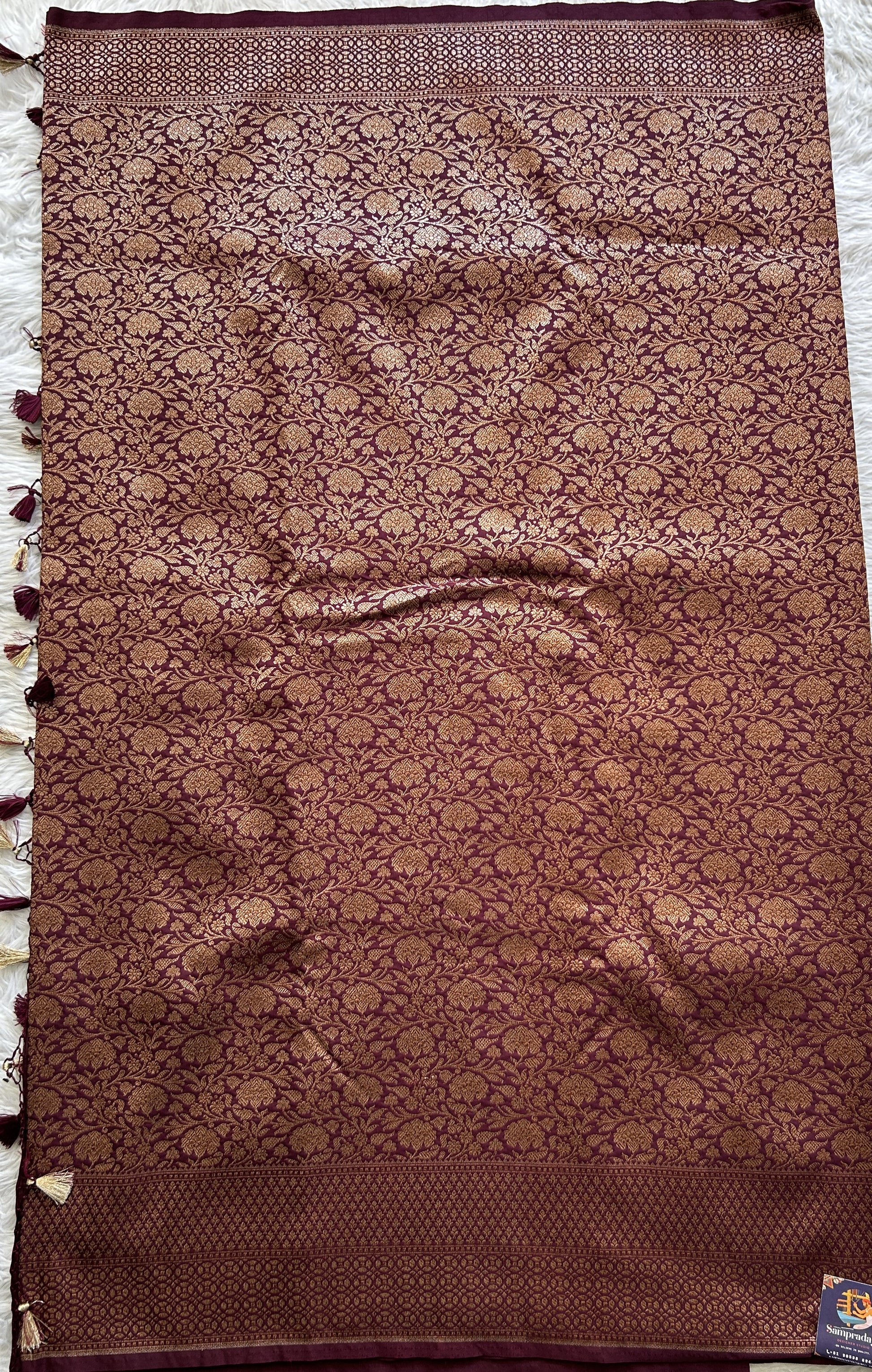 Banarasi Semi Katan Saree Dark Maroon Colored Complemented with a Zari Border. - Sampradaya Designer Studio