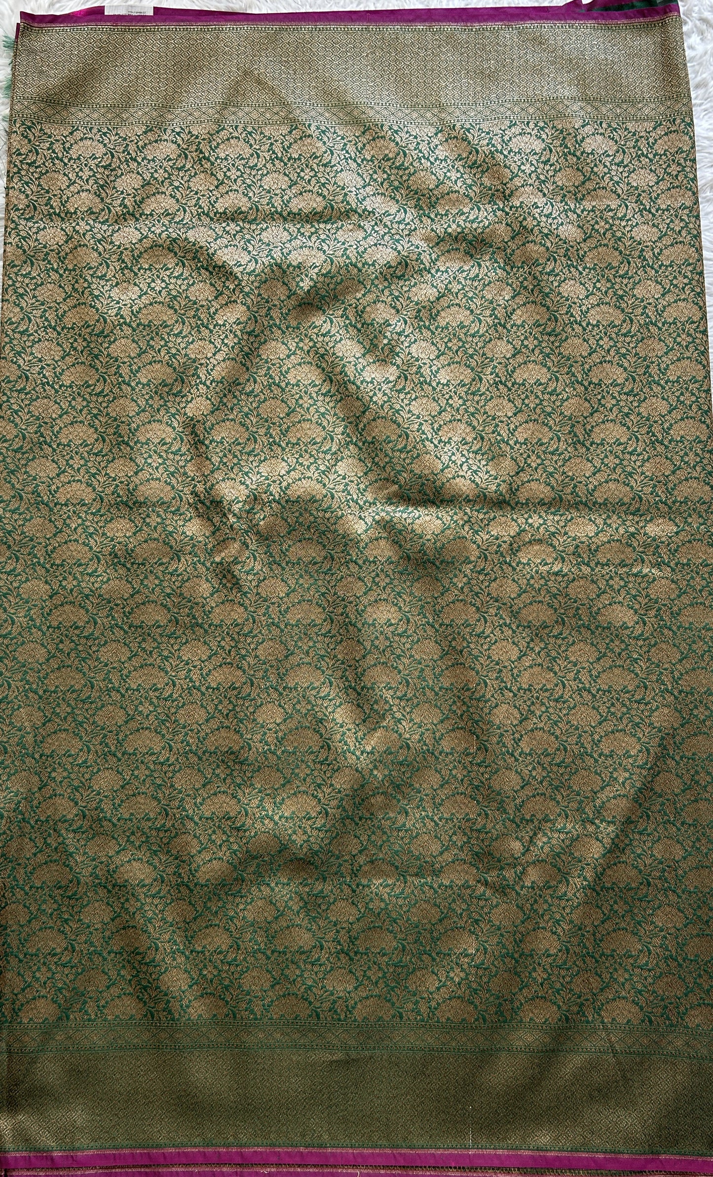 Banarasi Semi Katan Saree Green Colored Complemented with a Zari Border. - Sampradaya Designer Studio