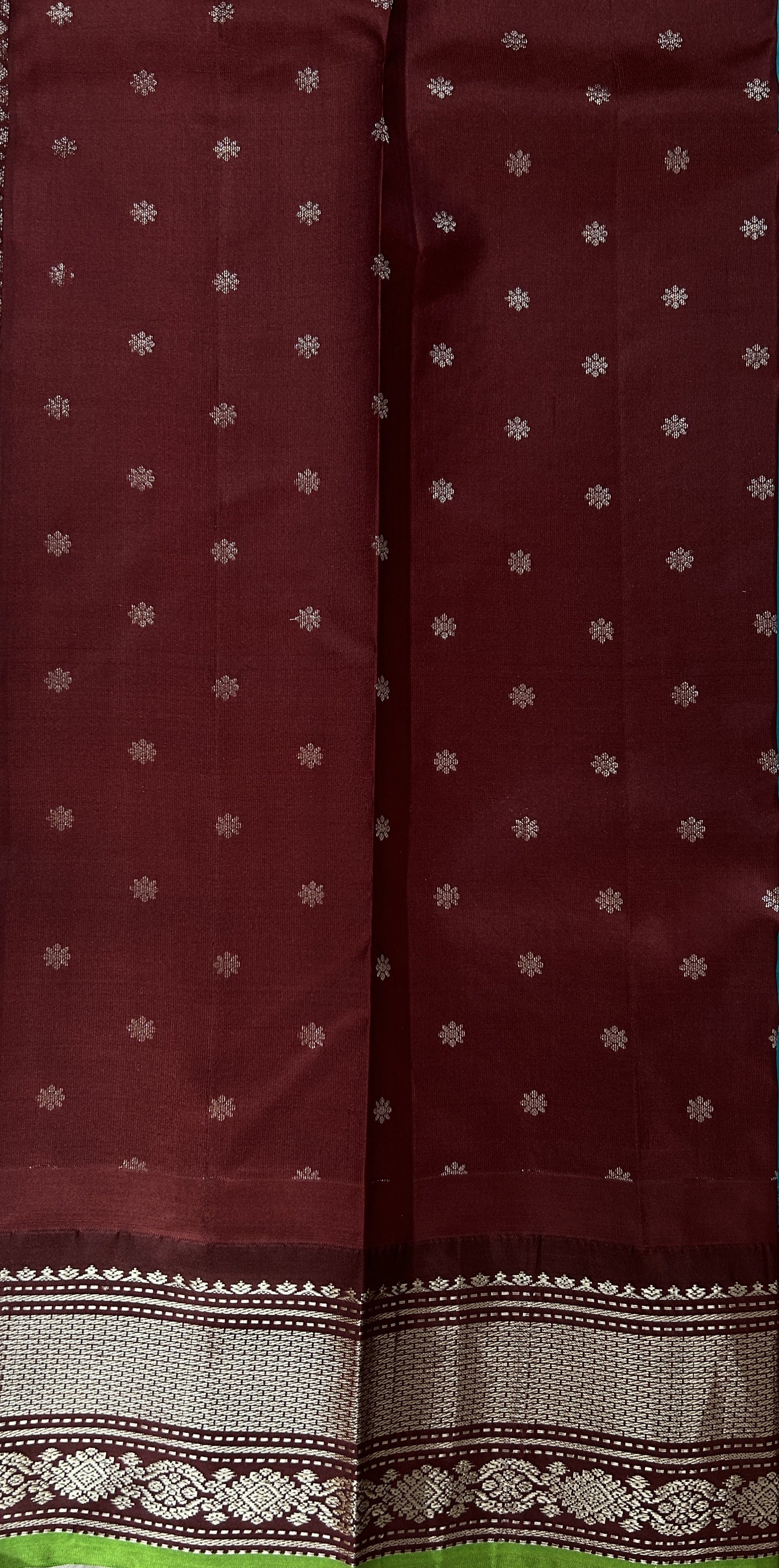 Gadwal Pattu Saree Turquoise Blue colored saree complemented with a Brown Kanchi Border - Sampradaya Designer Studio