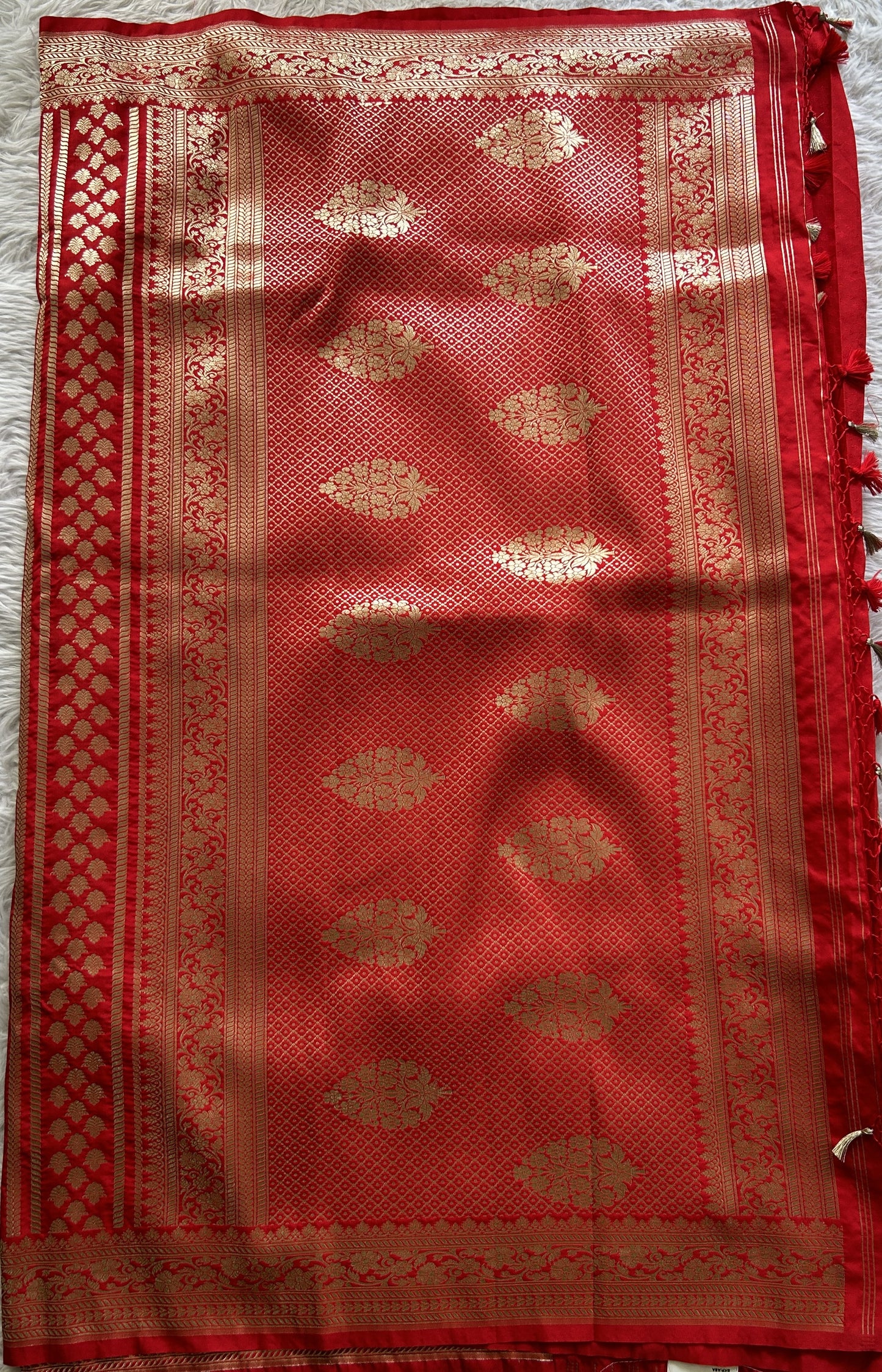 Banarasi Semi Katan Saree Red Colored Complemented with a Zari Border. - Sampradaya Designer Studio