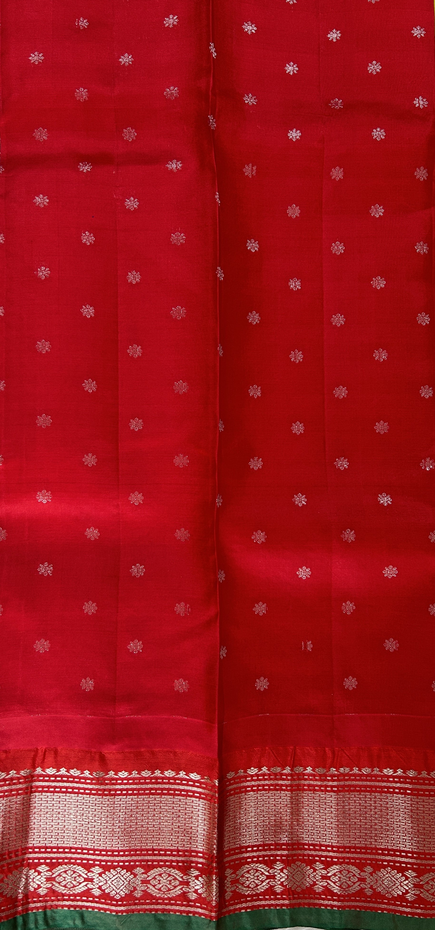 Gadwal Pattu Saree Acid Green colored saree complemented with a Candy Red Kanchi Border - Sampradaya Designer Studio