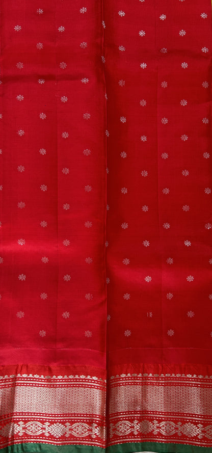Gadwal Pattu Saree Acid Green colored saree complemented with a Candy Red Kanchi Border - Sampradaya Designer Studio