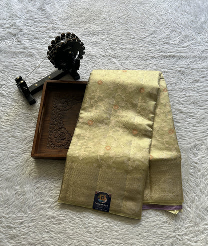 Chiniya Silk Saree Light Yellow Colored Elegantly Paired with a Zari Border. - Sampradaya Designer Studio