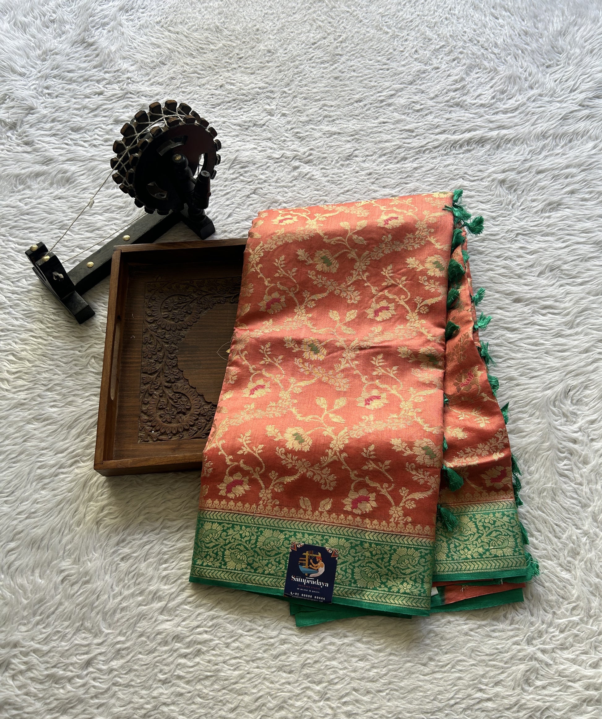 Chiniya Silk Saree Peach Colored Elegantly Paired with a Rama Green Color Zari Border. - Sampradaya Designer Studio