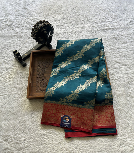 Chiniya Silk Saree Peacock Blue Colored Elegantly Paired with a Red Color Zari Border. - Sampradaya Designer Studio