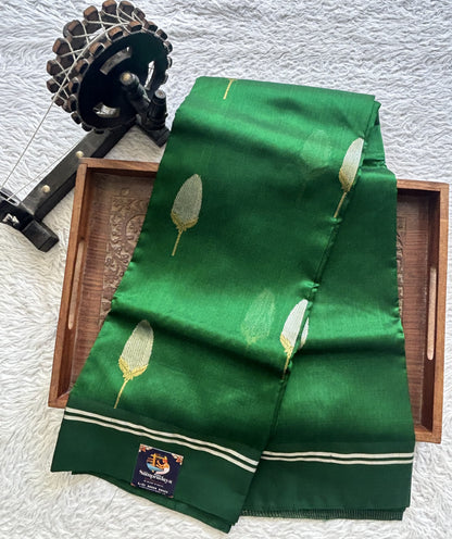 Chanderi Silk Saree Bottle green color Elegantly Paired with a Silver Zari border - Sampradaya Designer Studio