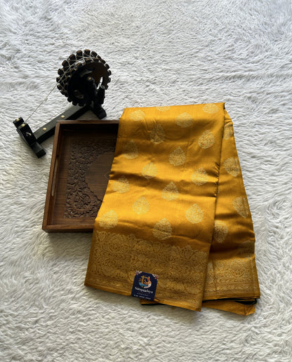 Chiniya Silk Saree Yellow Colored exquisite with a Zari Border. - Sampradaya Designer Studio