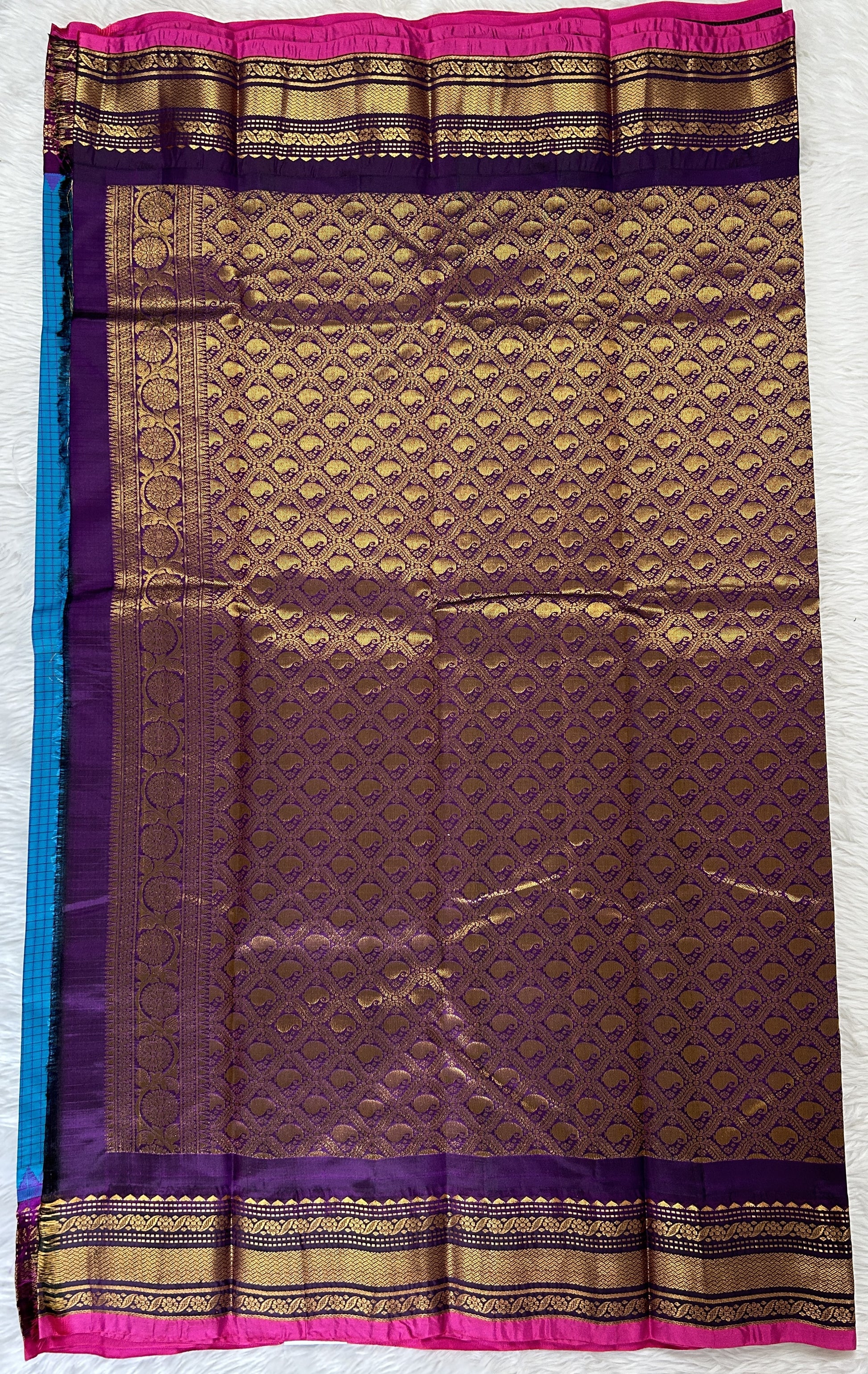 Gadwal Pattu Saree Turquoise Blue colored saree complemented with a Magenta Kanchi Border - Sampradaya Designer Studio