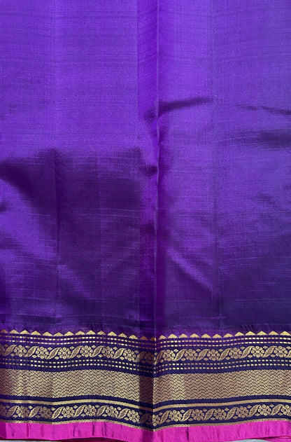Gadwal Pattu Saree Turquoise Blue colored saree complemented with a Magenta Kanchi Border - Sampradaya Designer Studio