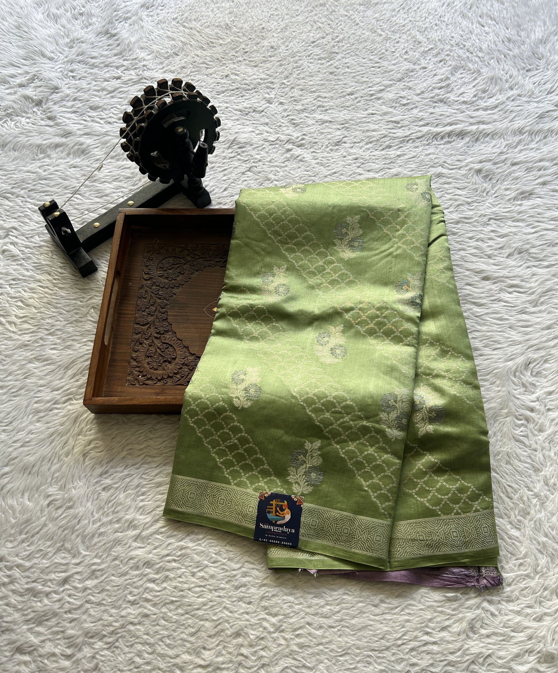 Chiniya Silk Saree Light Green Colored Exquisite with a Zari Border. - Sampradaya Designer Studio