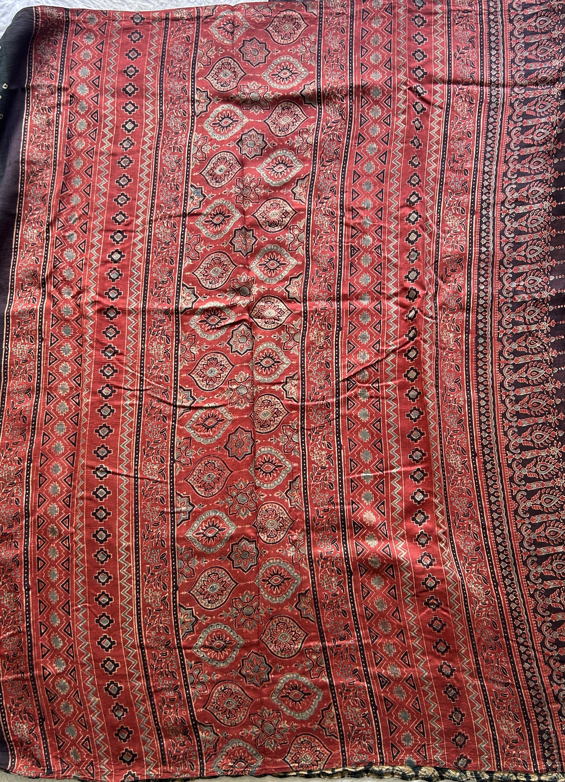 Bandhani Saree Black Colored Elegantly Paired with a Borderless. - Sampradaya Designer Studio