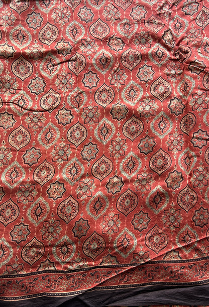 Bandhani Saree Black Colored Elegantly Paired with a Borderless. - Sampradaya Designer Studio