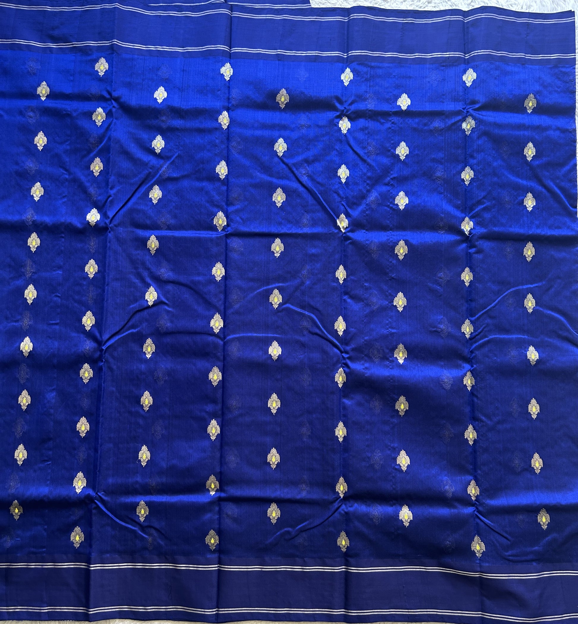 Chanderi Silk Blue color Elegantly Paired with a Silver Zari border - Sampradaya Designer Studio