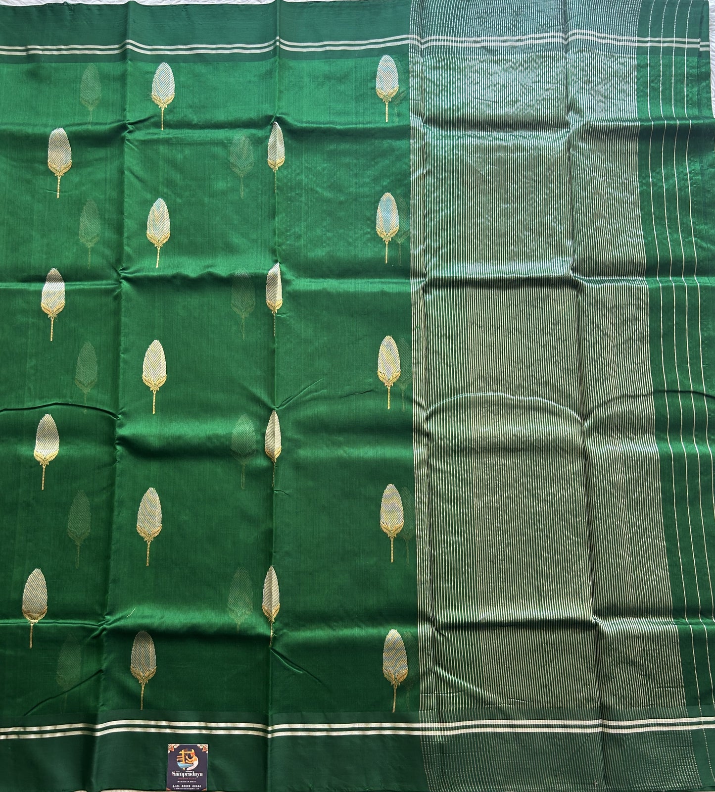 Chanderi Silk Saree Bottle green color Elegantly Paired with a Silver Zari border - Sampradaya Designer Studio