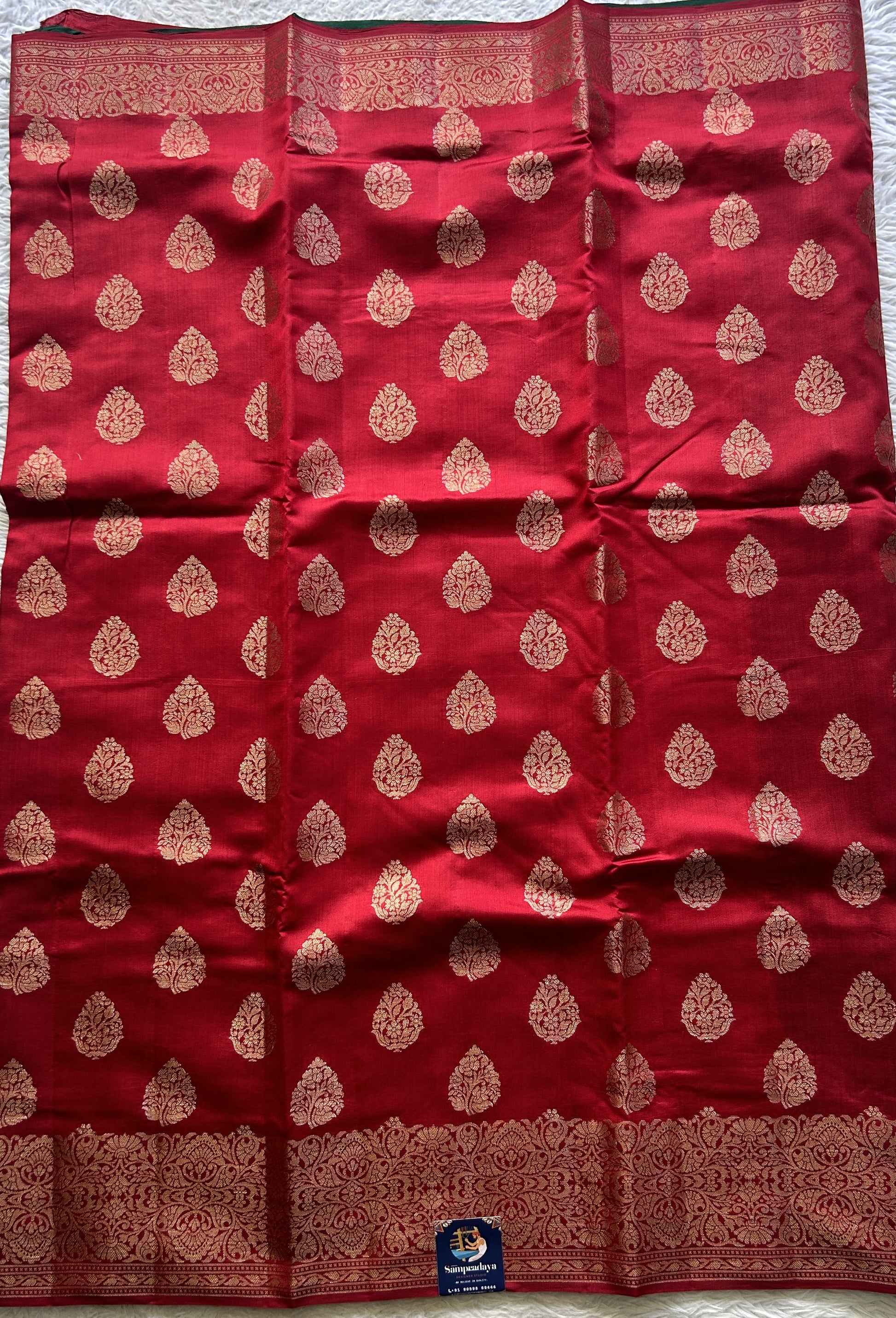 Chiniya Silk Saree Red Colored exquisite with a Zari Border. - Sampradaya Designer Studio