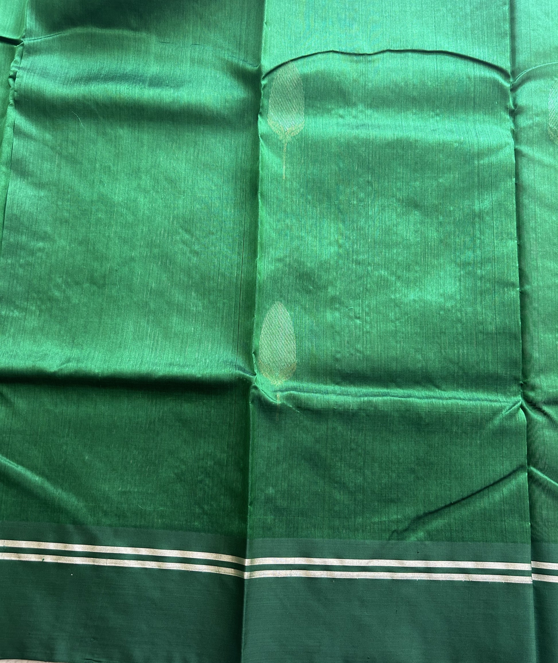 Chanderi Silk Saree Bottle green color Elegantly Paired with a Silver Zari border - Sampradaya Designer Studio