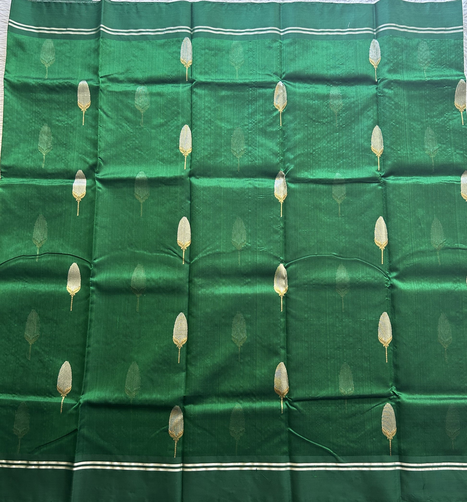 Chanderi Silk Saree Bottle green color Elegantly Paired with a Silver Zari border - Sampradaya Designer Studio