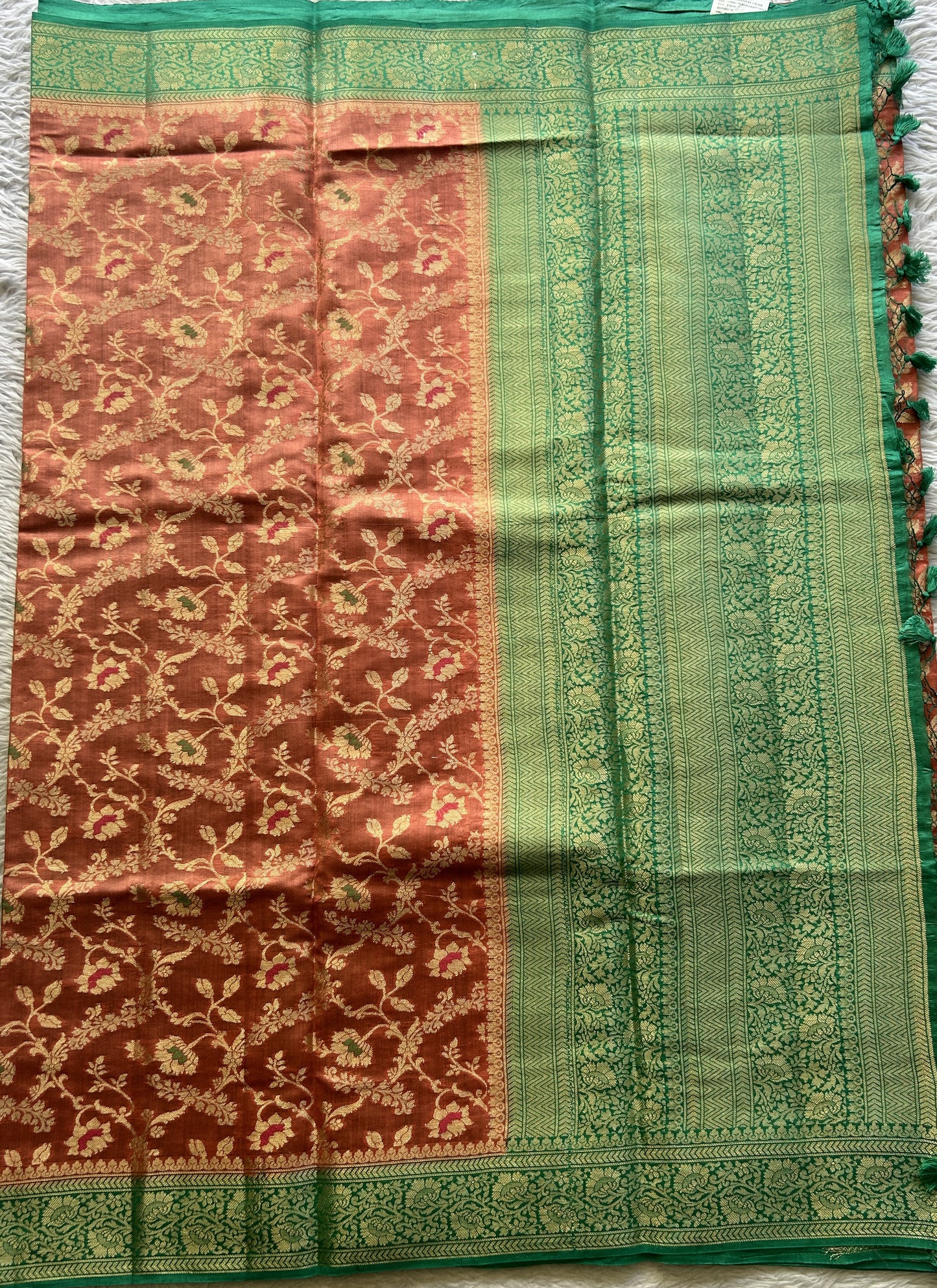Chiniya Silk Saree Peach Colored Elegantly Paired with a Rama Green Color Zari Border. - Sampradaya Designer Studio