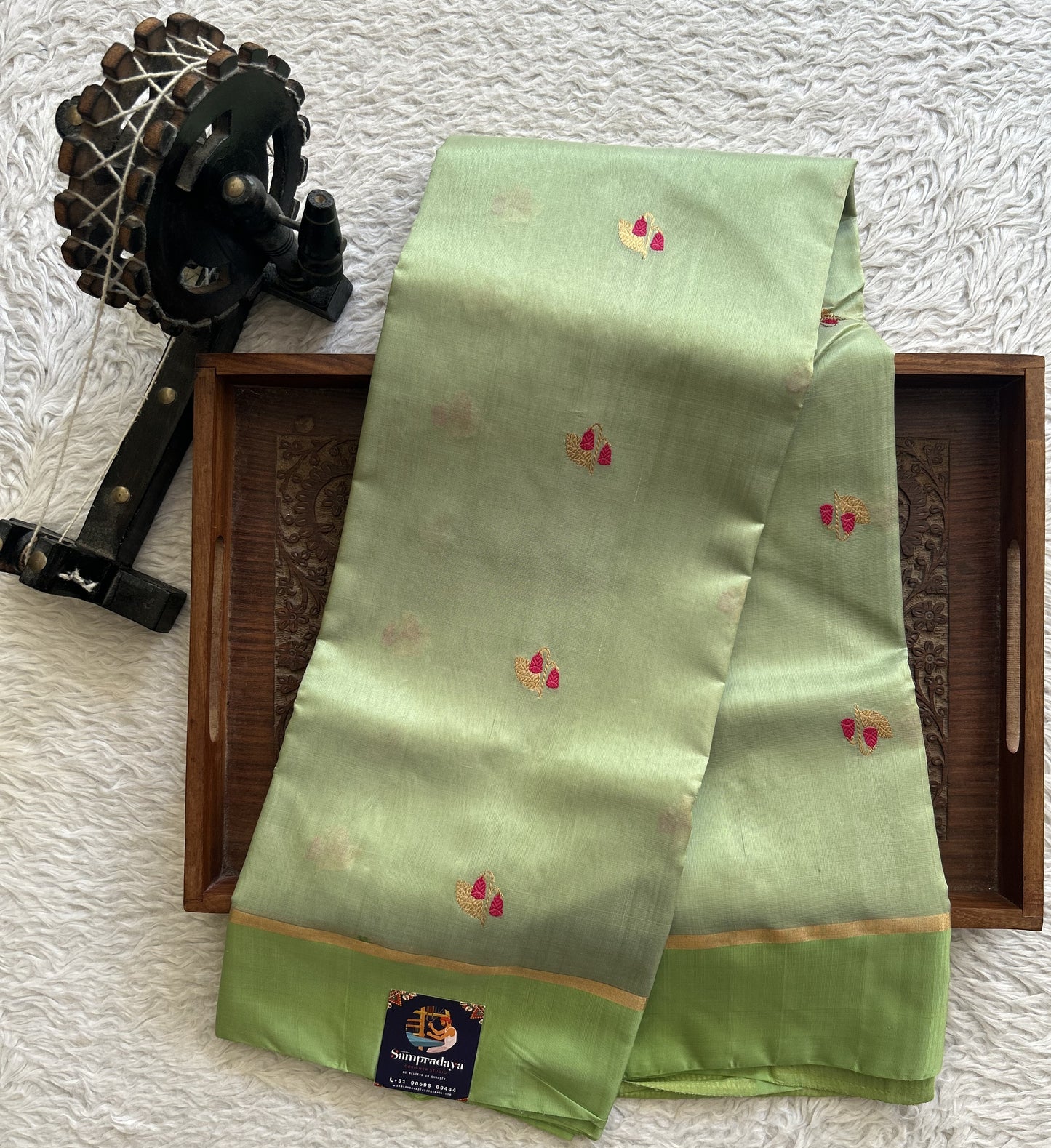 Chanderi Silk pasta Green color Elegantly Paired with a Gold Zari border - Sampradaya Designer Studio