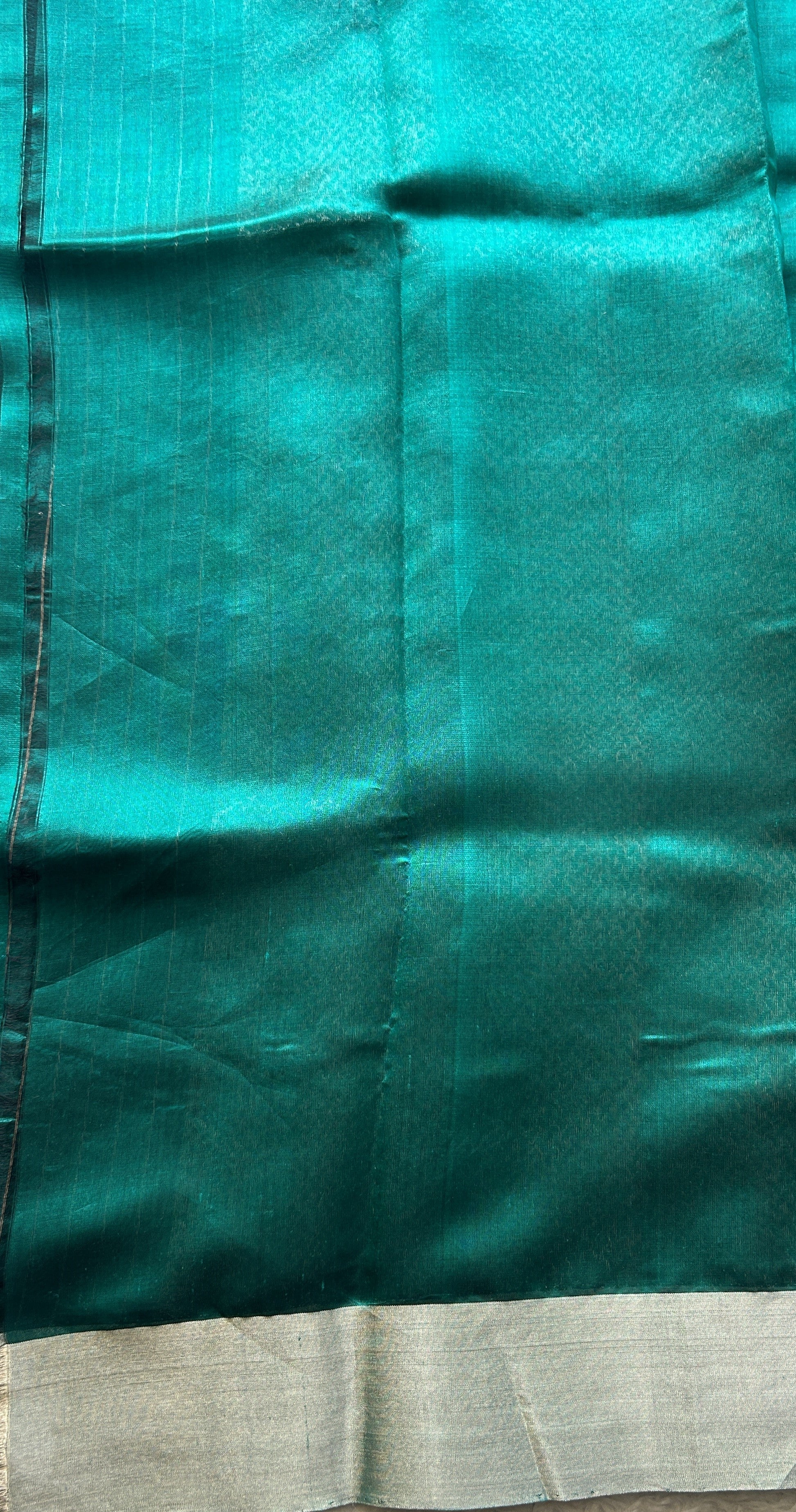 Chanderi Silk Saree Peacock Green color Elegantly Paired with a Zari border - Sampradaya Designer Studio