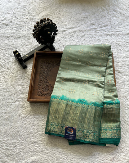 Bandhani Saree Miami Buff Colored Elegantly Paired with a Rama Green Color Zari Border. - Sampradaya Designer Studio